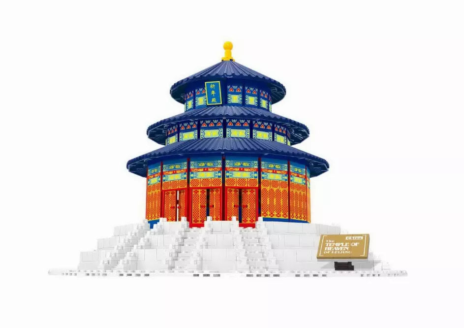 Pagoda temple building model with blue roof tiers and red body walls on white base