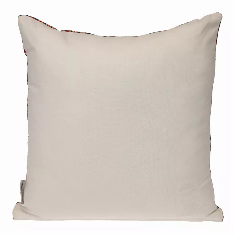 Square pillow with solid light beige fabric and patterned trim at the corners