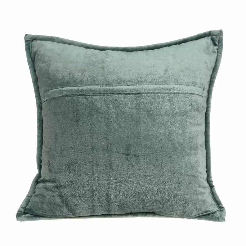 Sea foam quilted square throw pillow with stitched front panel and curved corner detail.