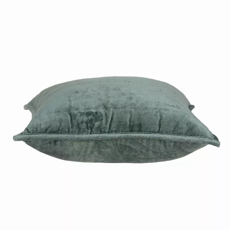 Sea foam quilted throw pillow, side view with stitched seam and fabric texture.
