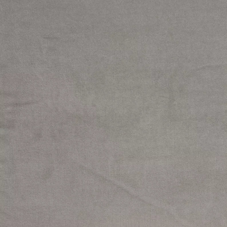 Gray solid throw pillow fabric close-up with subtle texture