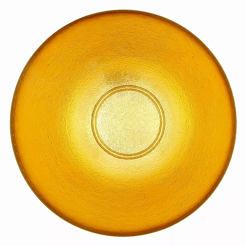 Golden glass salad bowl bottom with centered circular ring detail