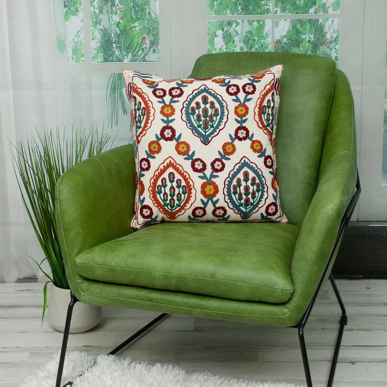 Multicolor embroidered throw pillow with centered floral cactus medallion pattern
