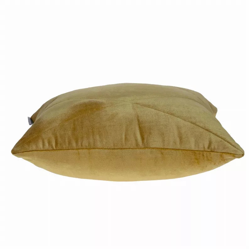 Yellow throw pillow cover shown from the side with stitched center panel