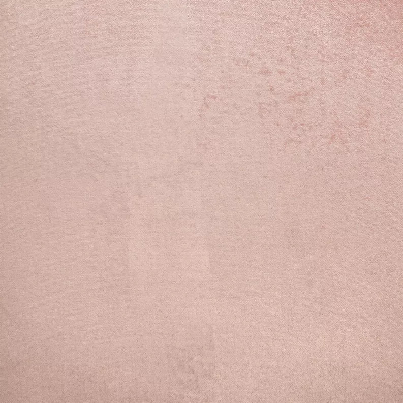 Pink throw pillow fabric texture close-up with smooth short pile