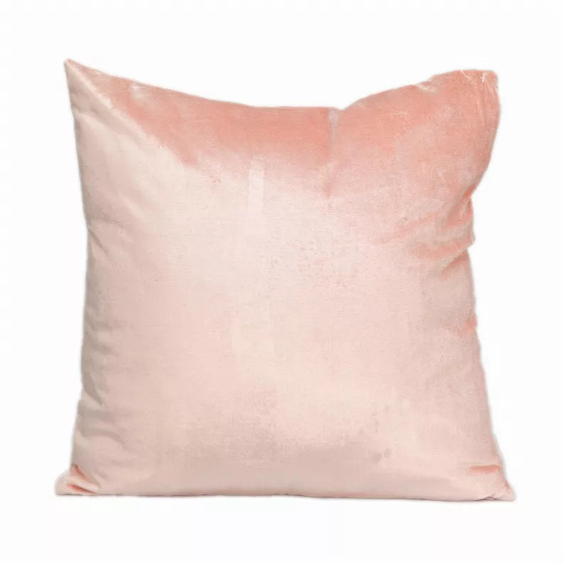 Pink square throw pillow with centered seam and plush front