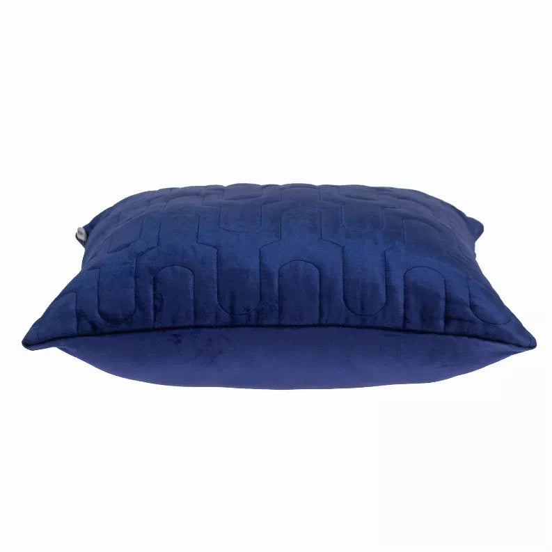 Blue quilted throw pillow, side view showing dense stitched quilting