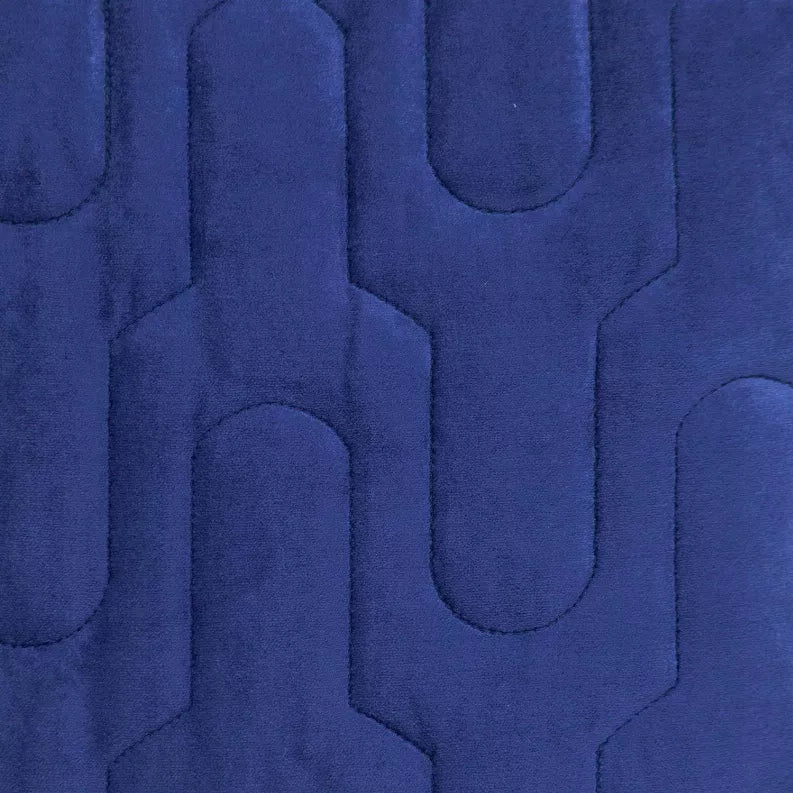Blue quilted throw pillow cover close-up with raised U-shaped stitch motif