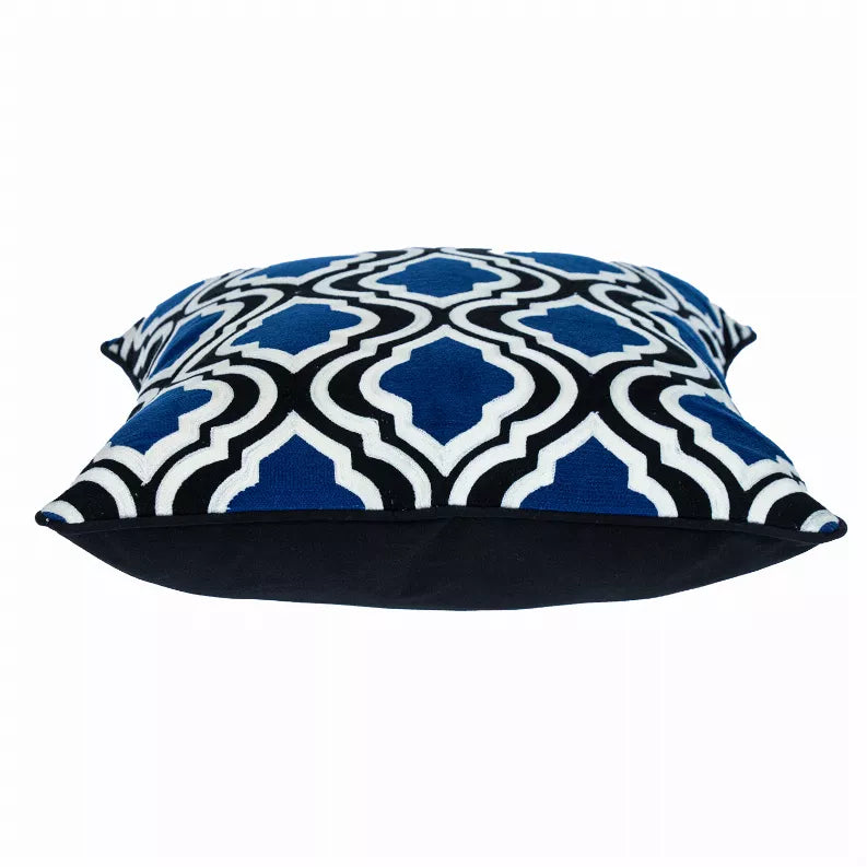 Blue and white geometric square pillow with dark back and envelope-style edge