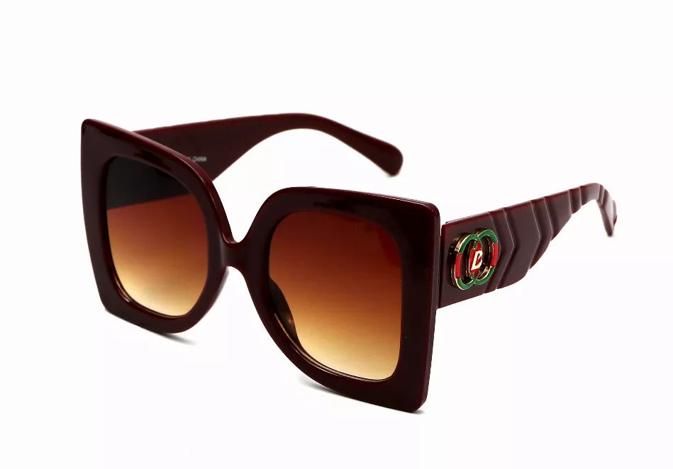 Dark brown square sunglasses with amber-tinted lenses and ridged temple arms.