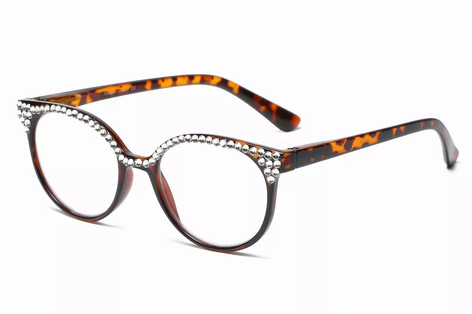 Tortoiseshell reading glasses with round frames, rhinestone bridge, and patterned temples