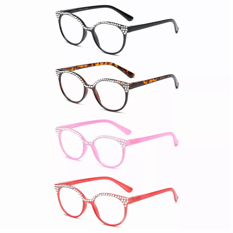 Assorted reading glasses with round frames, rhinestone accents, and varying colored temples