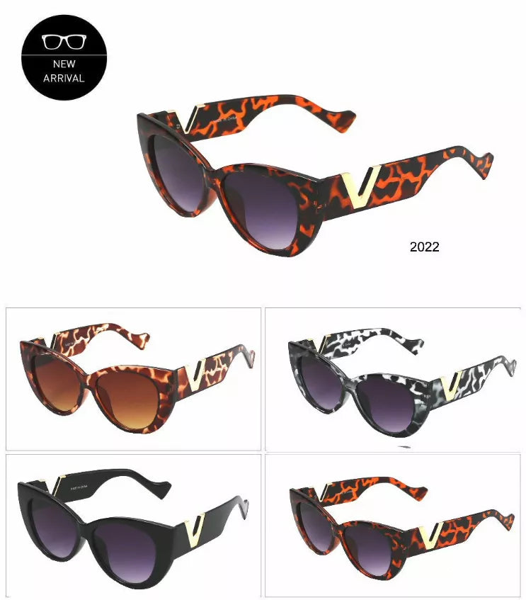 Sunglasses assortment showing tortoiseshell and black frames with dark tinted lenses.