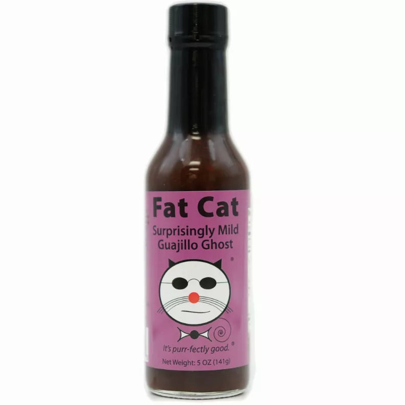 Hot sauce bottle with purple Fat Cat label and black cap