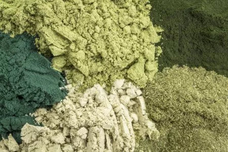 Green and light-green powdered herb blend for meal topper
