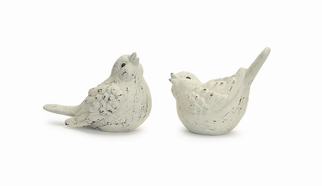 White bird figurines, set of 4, small perched sculptures with detailed feather texture.