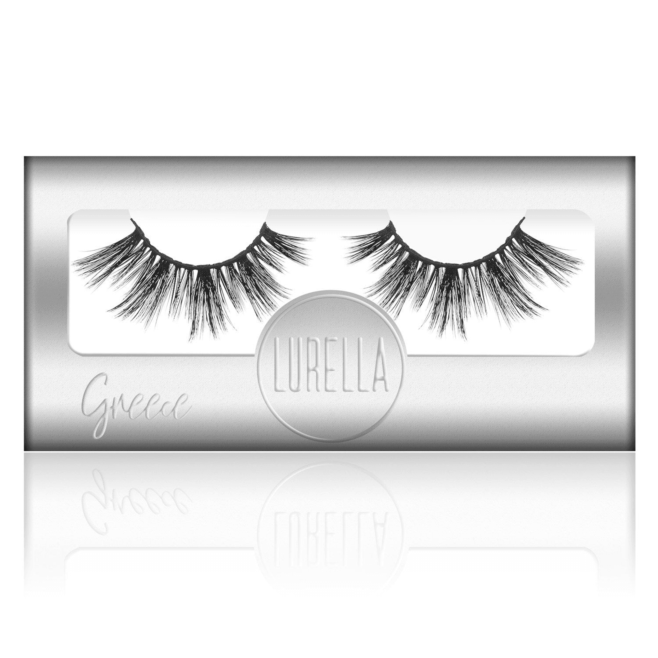 Synthetic false eyelashes in a clear display box with printed brand label