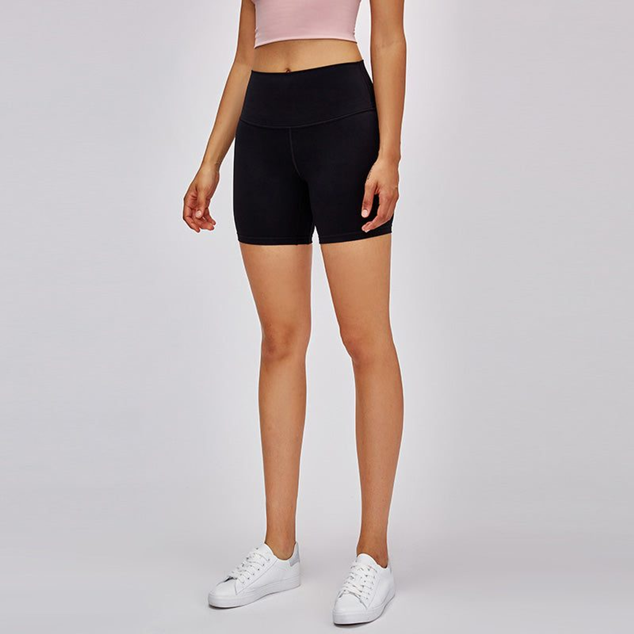 Black high-rise biker shorts with smooth waistband and snug fit