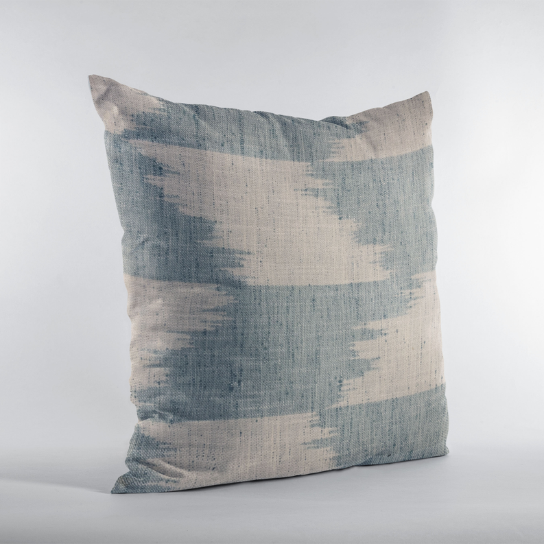 Blue and beige abstract throw pillow with textured fabric, full front view