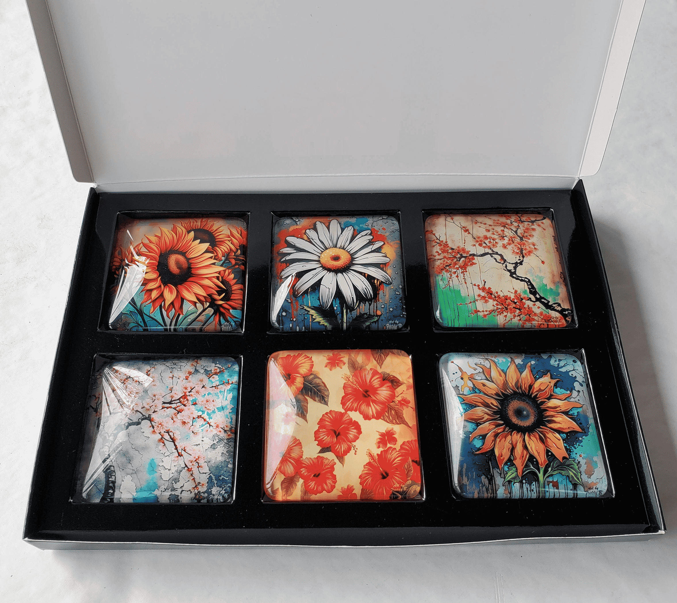 Set of 6 square acrylic glass magnets, six colorful floral prints in open box