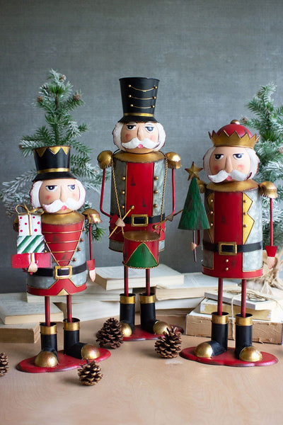Painted metal nutcracker set of three, three soldiers in red uniforms with gold crowns