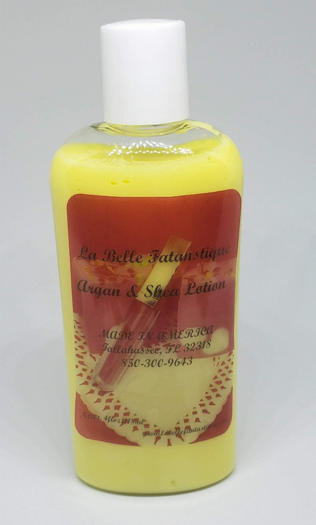 Shea and argan lotion bottle, yellow cap, yellow-green bottle with cream label