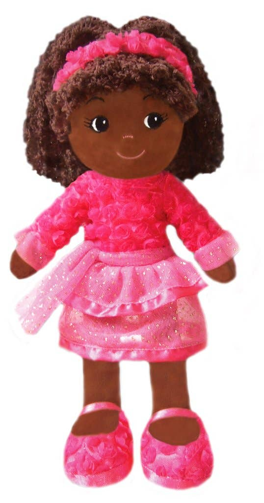 Dancing doll with curly dark-brown hair, pink headband, and layered pink dress.