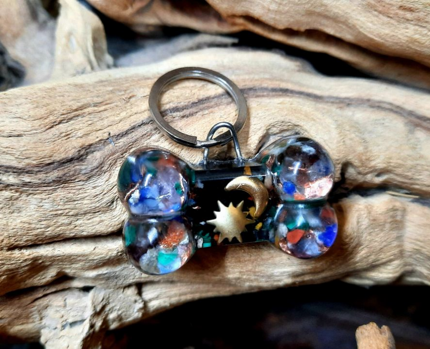 Blue iridescent DogBone pet charm keychain with star pendant and metal ring