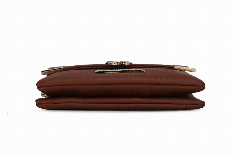 Cognac multi-compartment crossbody bag profile view with top flap and folded strap