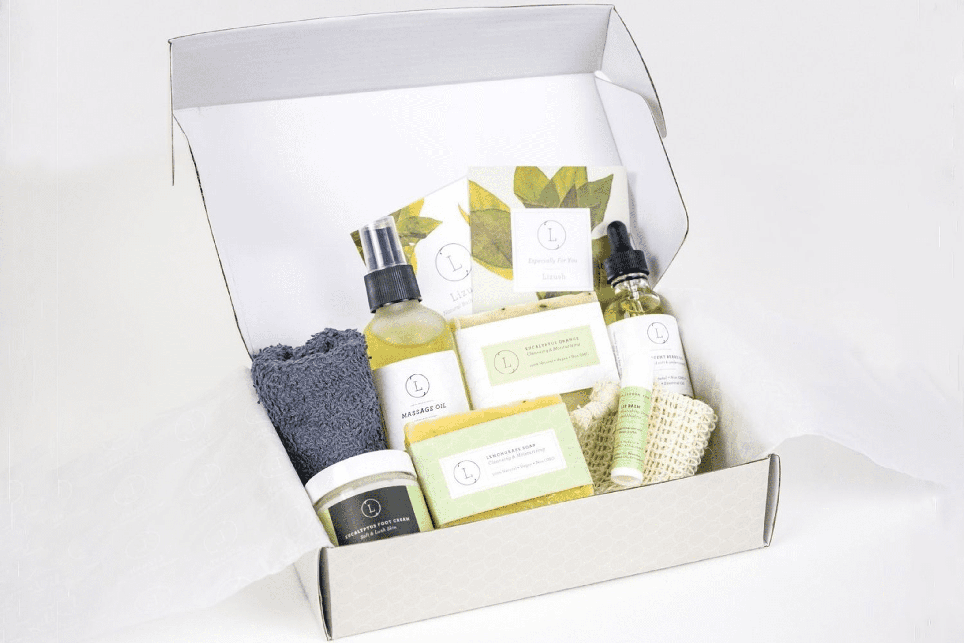 Assorted skincare gift box with bottles, soap bars, and labeled care items