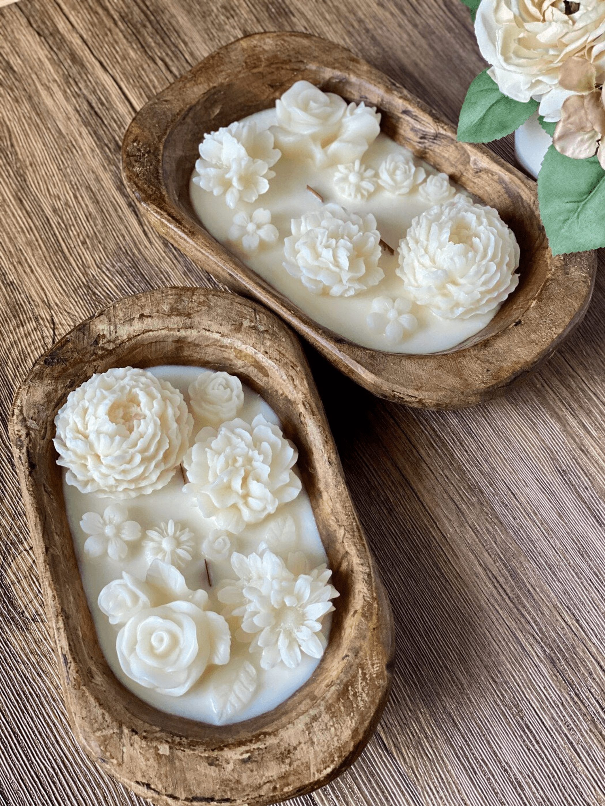 Rustic wooden dough bowl candle with white floral wax details