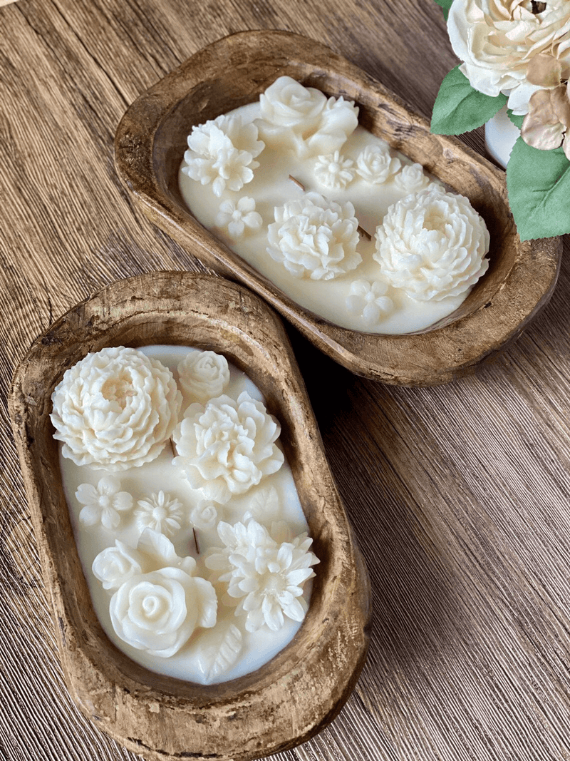Rustic wooden dough bowl candle with white floral wax details