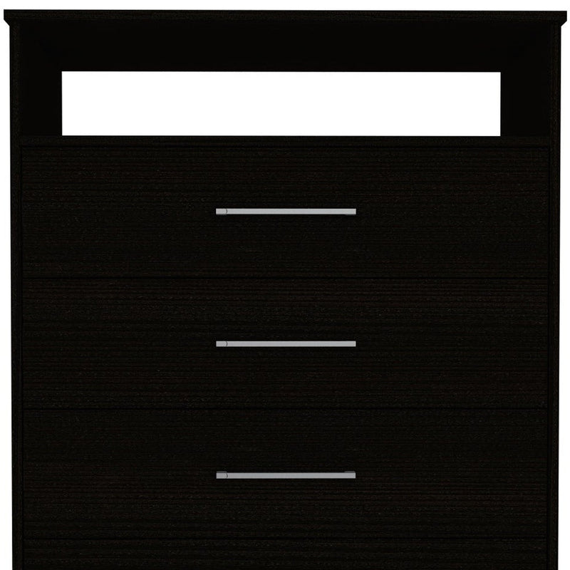 Black four-drawer dresser close-up of three drawer fronts with silver bar pulls