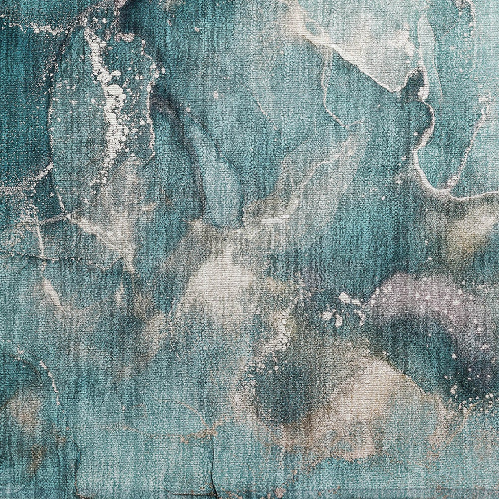 Teal abstract area rug close-up with distressed beige veining and white flecks