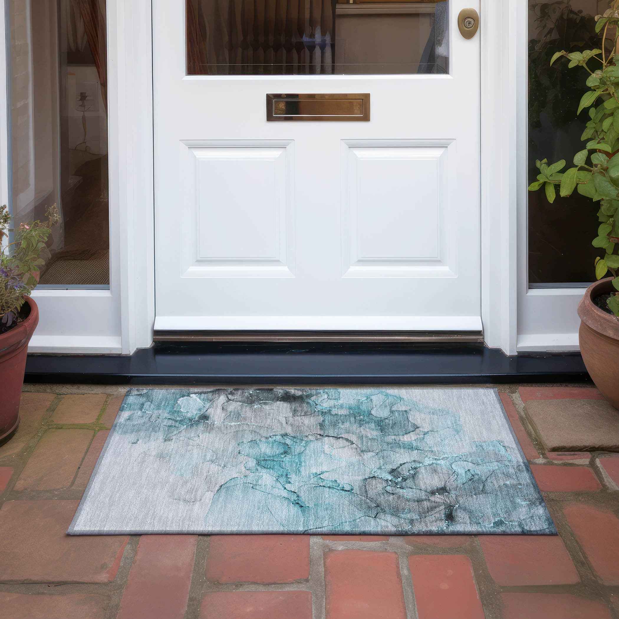 2' X 3' Teal Abstract Washable Non Skid Indoor Outdoor Area Rug