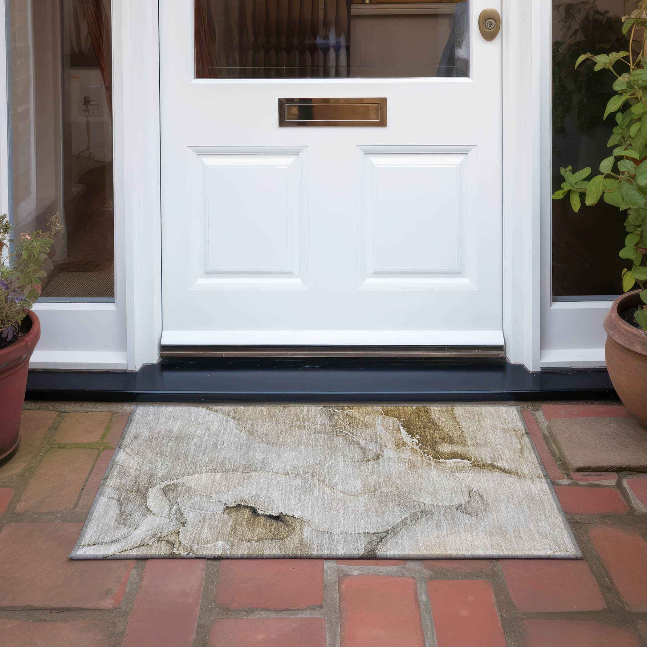 2' X 3' Beige and Brown Abstract Washable Indoor Outdoor Area Rug