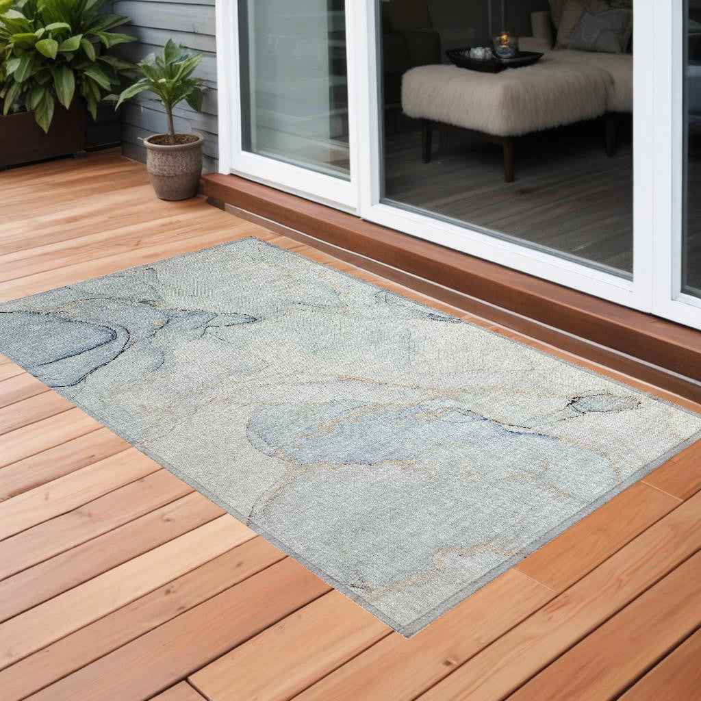 3' X 5' Beige and Blue Abstract Washable Non Skid Indoor Outdoor Area Rug