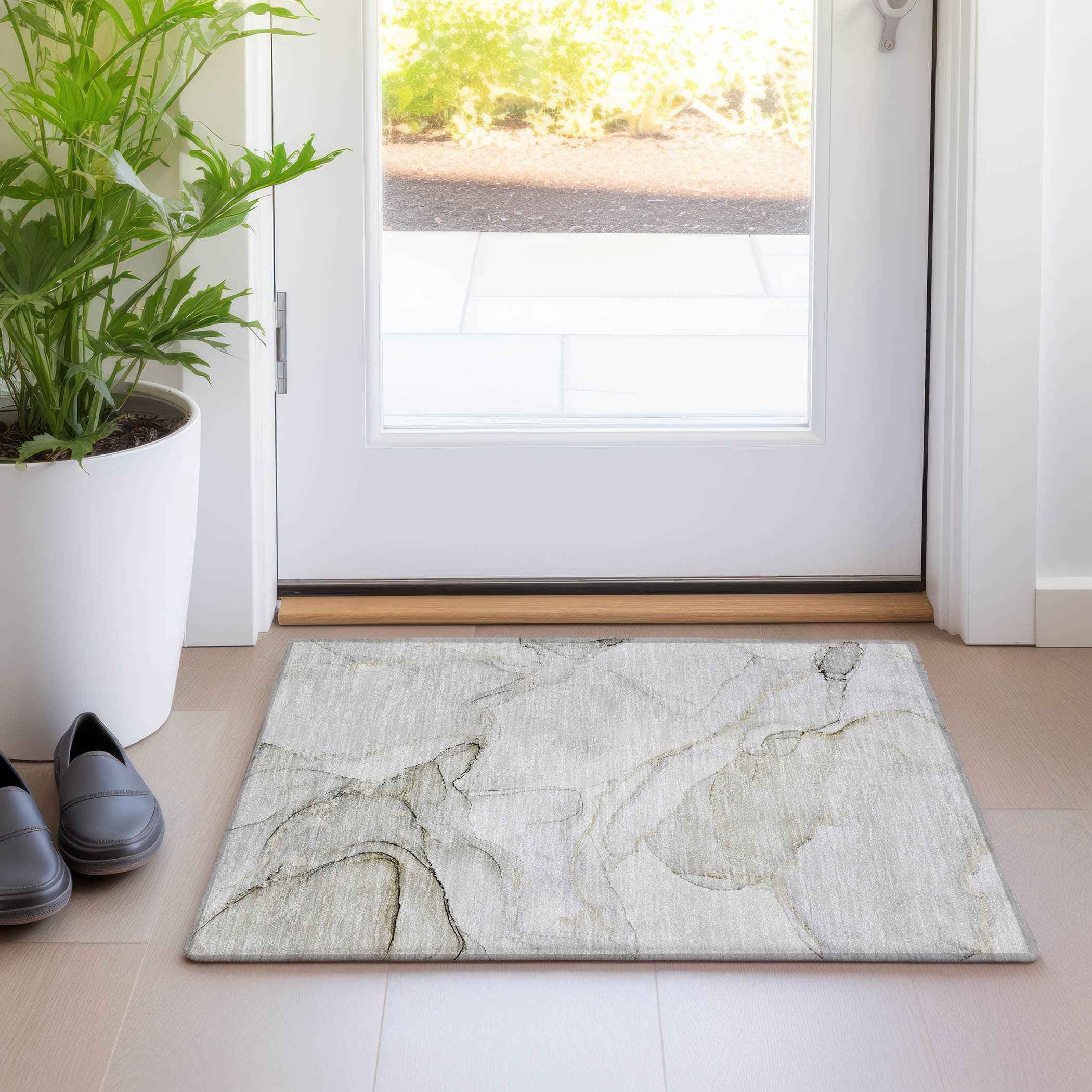 2' X 3' Beige and Ivory Abstract Washable Indoor Outdoor Area Rug