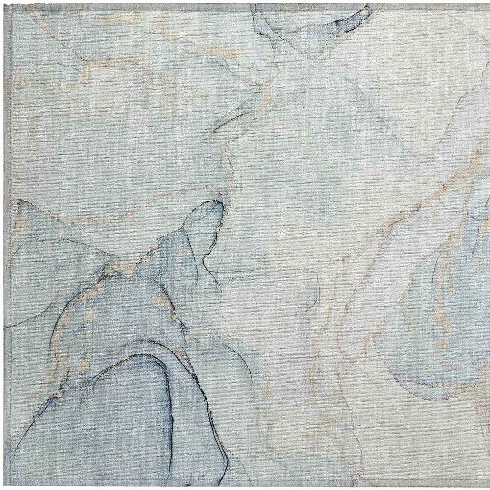 2' X 3' Beige and Blue Abstract Washable Non Skid Indoor Outdoor Area Rug