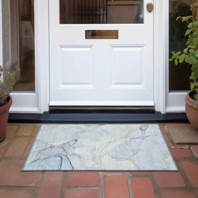 2' X 3' Beige and Blue Abstract Washable Non Skid Indoor Outdoor Area Rug