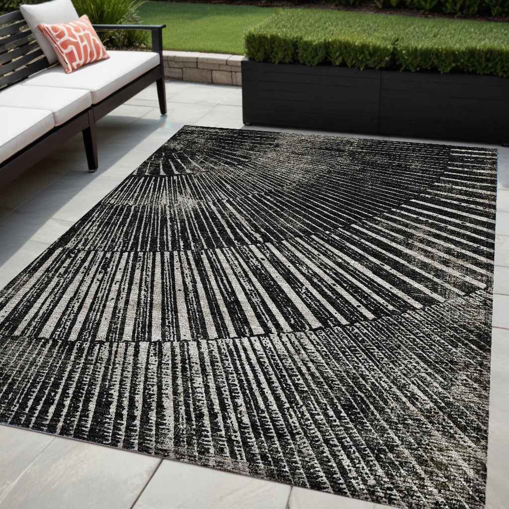 5' X 8' Black And Ivory Abstract Washable Indoor Outdoor Area Rug
