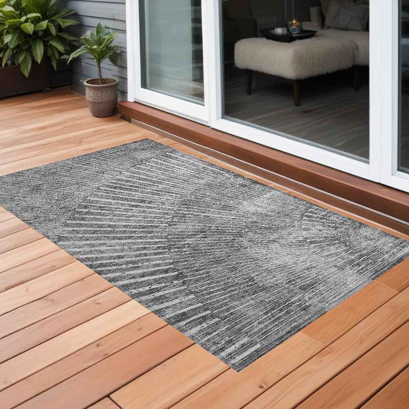 2' X 3' Gray and Ivory Abstract Washable Non Skid Indoor Outdoor Area Rug