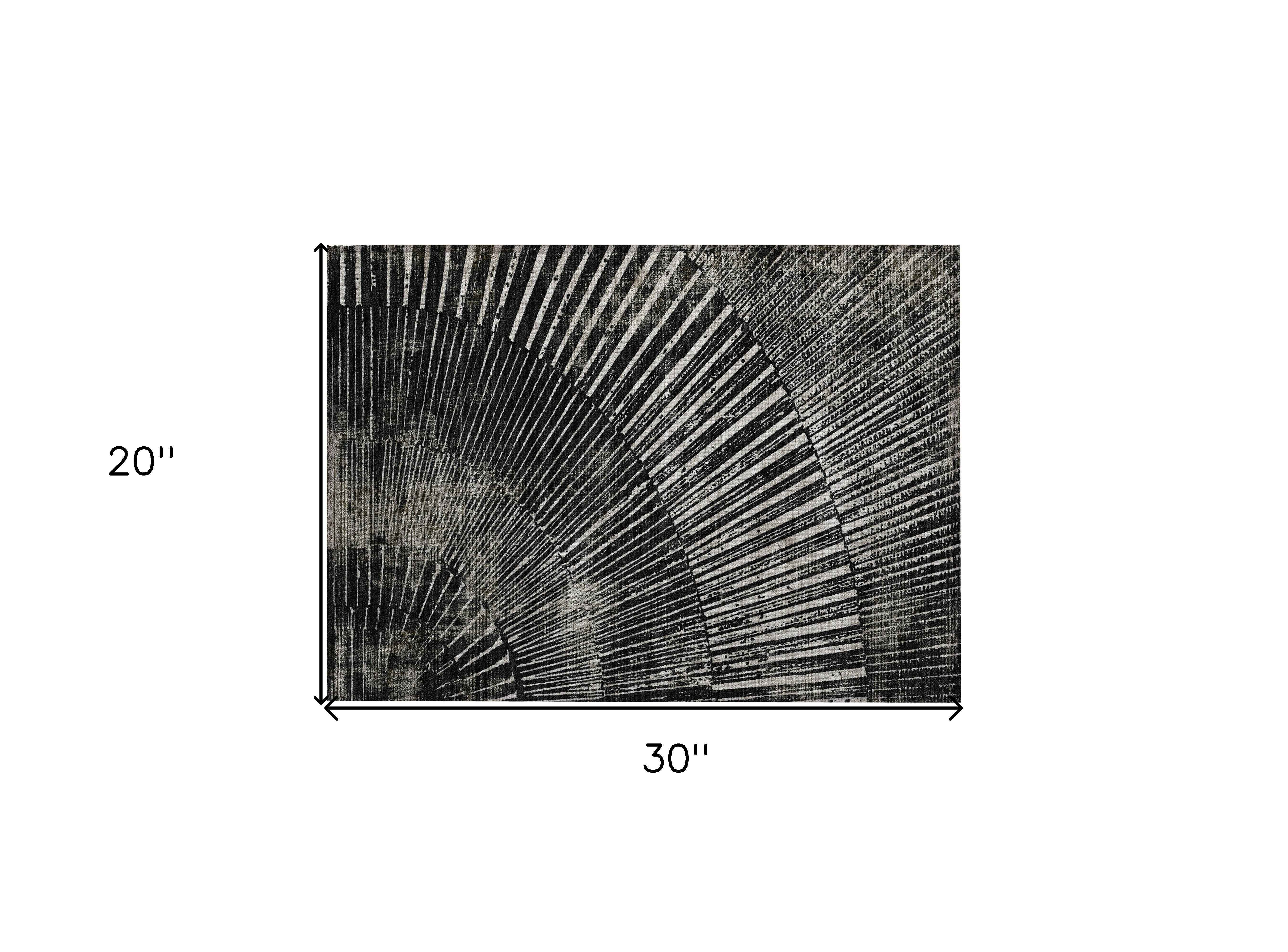 2' X 3' Black and Ivory Abstract Washable Non Skid Indoor Outdoor Area Rug