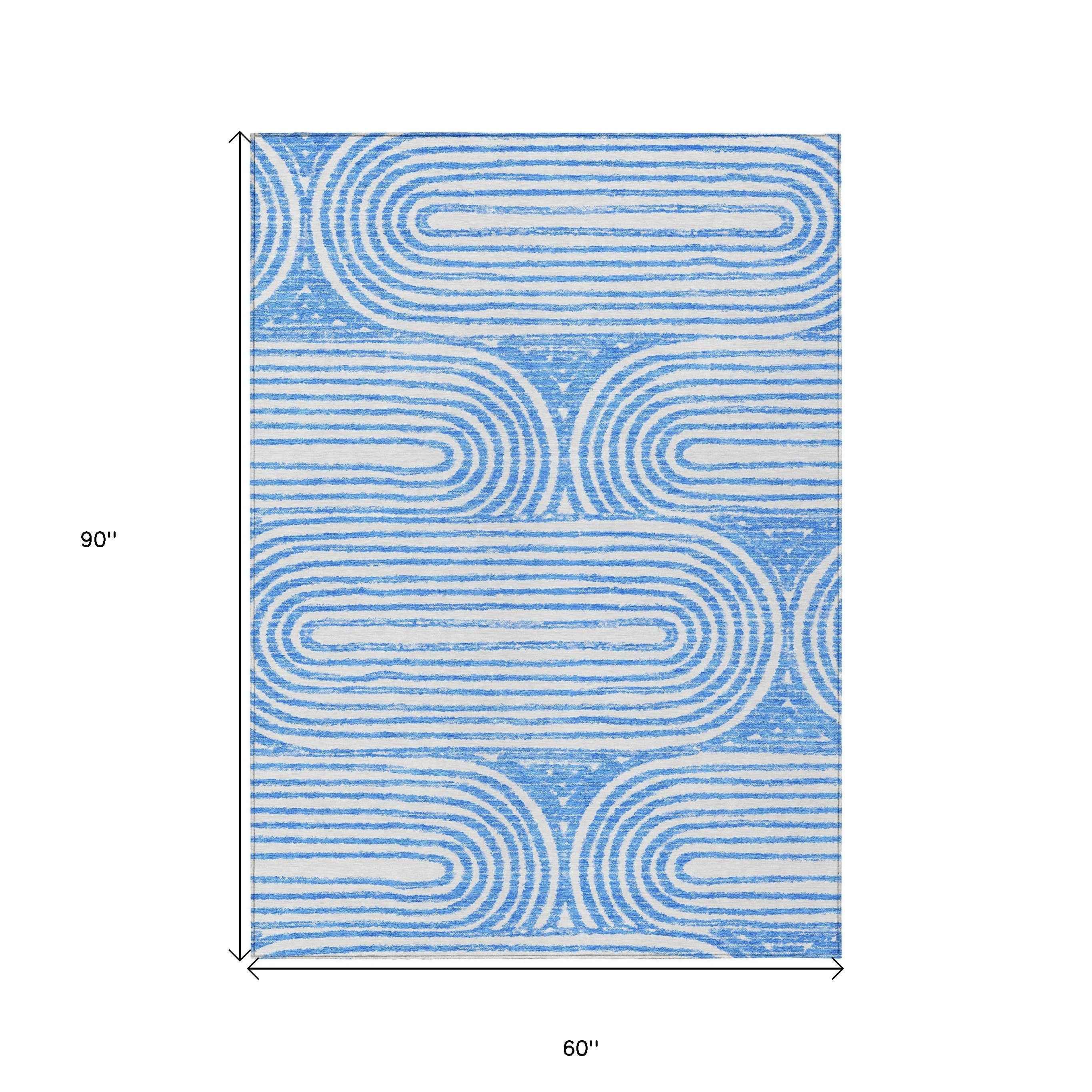 5' X 8' Blue and White Abstract Washable Non Skid Indoor Outdoor Area Rug