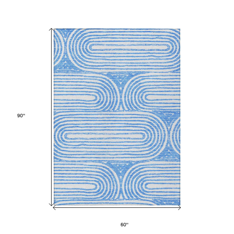 5' X 8' Blue and White Abstract Washable Non Skid Indoor Outdoor Area Rug