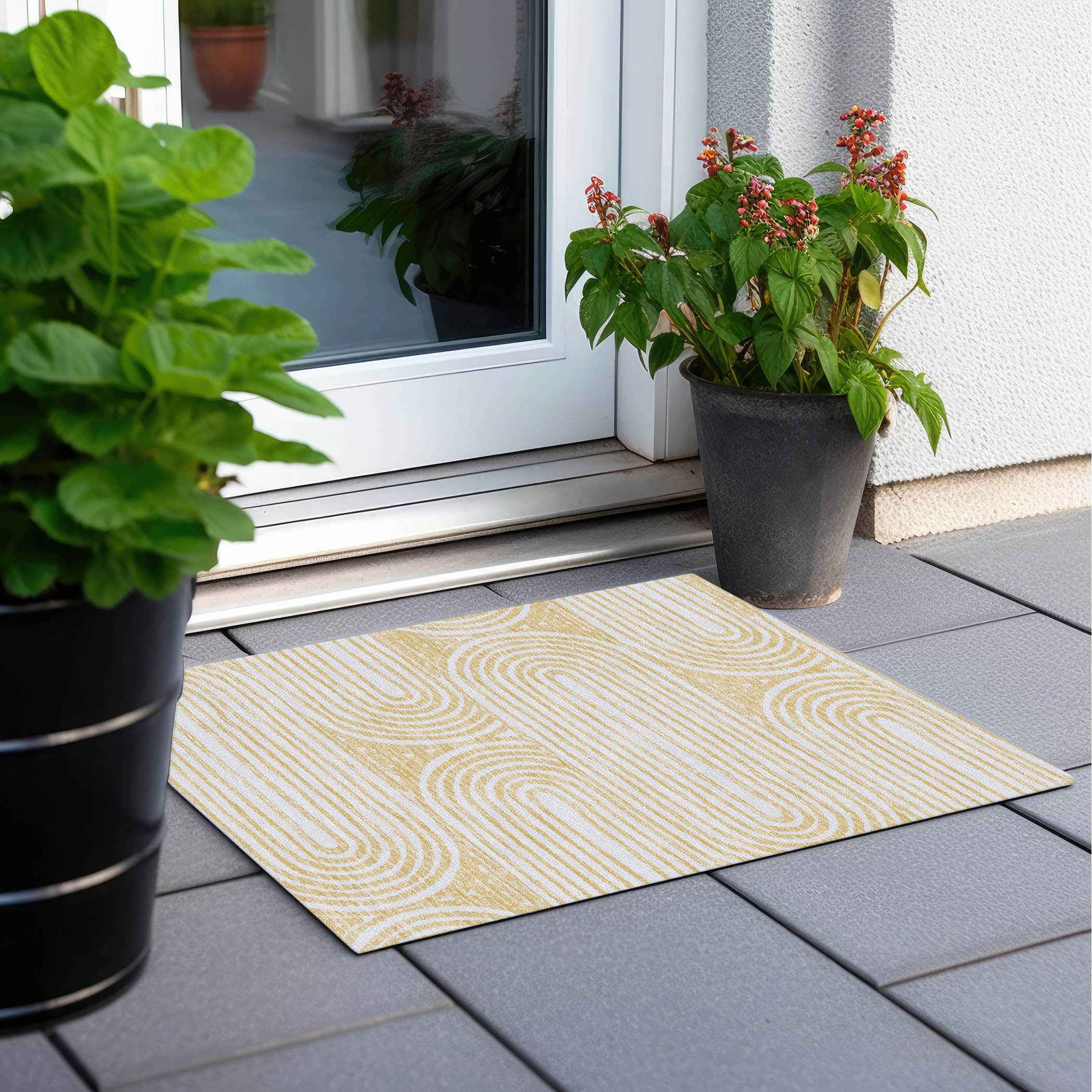 2' X 3' Gold and White Abstract Washable Non Skid Indoor Outdoor Area Rug