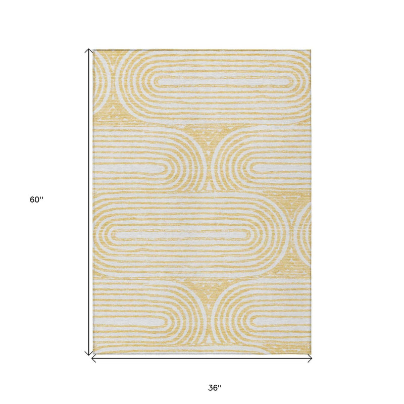 3' X 5' Gold and White Abstract Washable Non Skid Indoor Outdoor Area Rug
