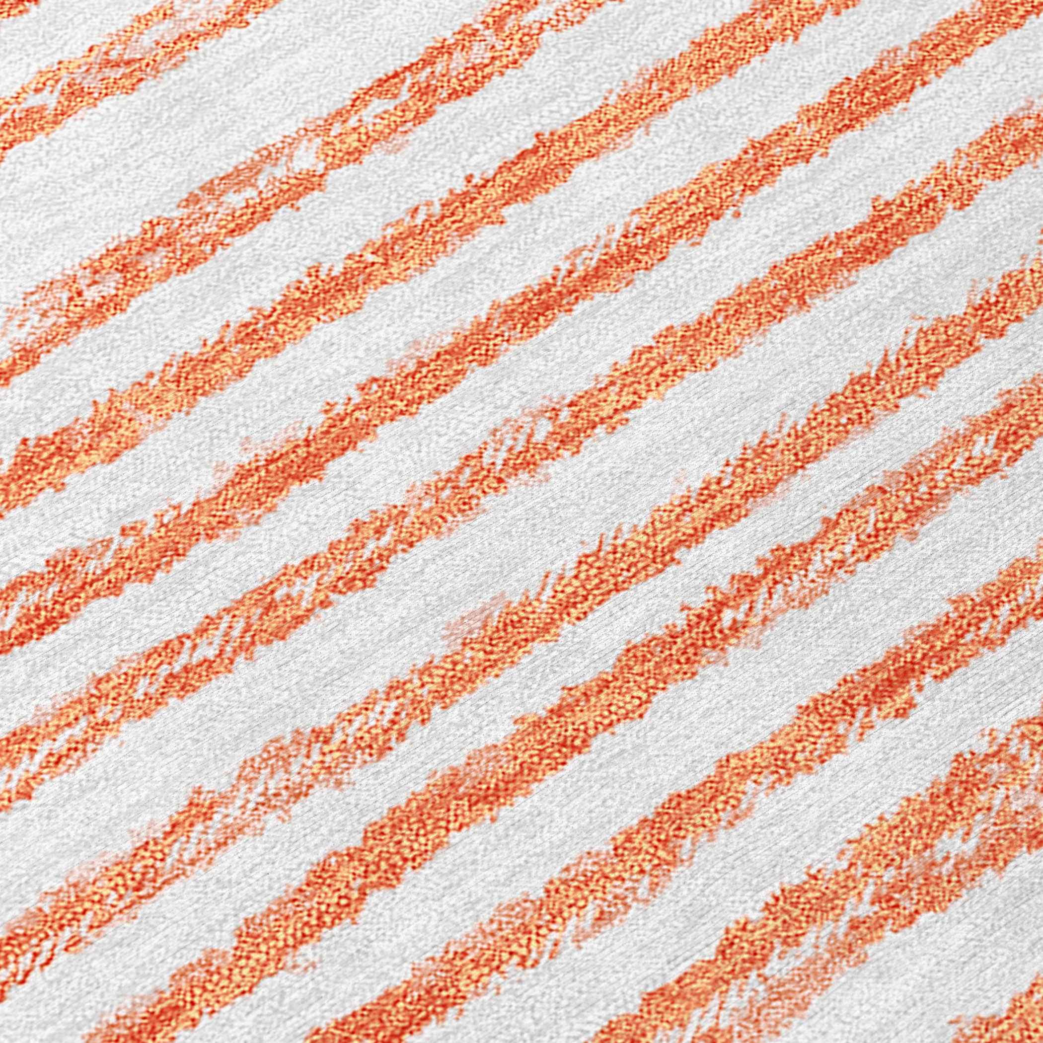 2' X 3' Orange and Ivory Abstract Washable Non Skid Indoor Outdoor Area Rug