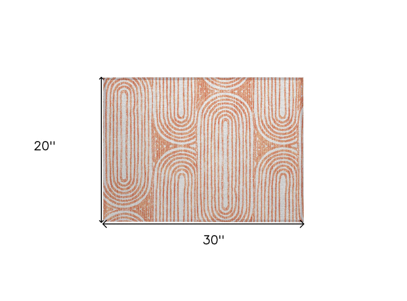 2' X 3' Orange and Ivory Abstract Washable Non Skid Indoor Outdoor Area Rug