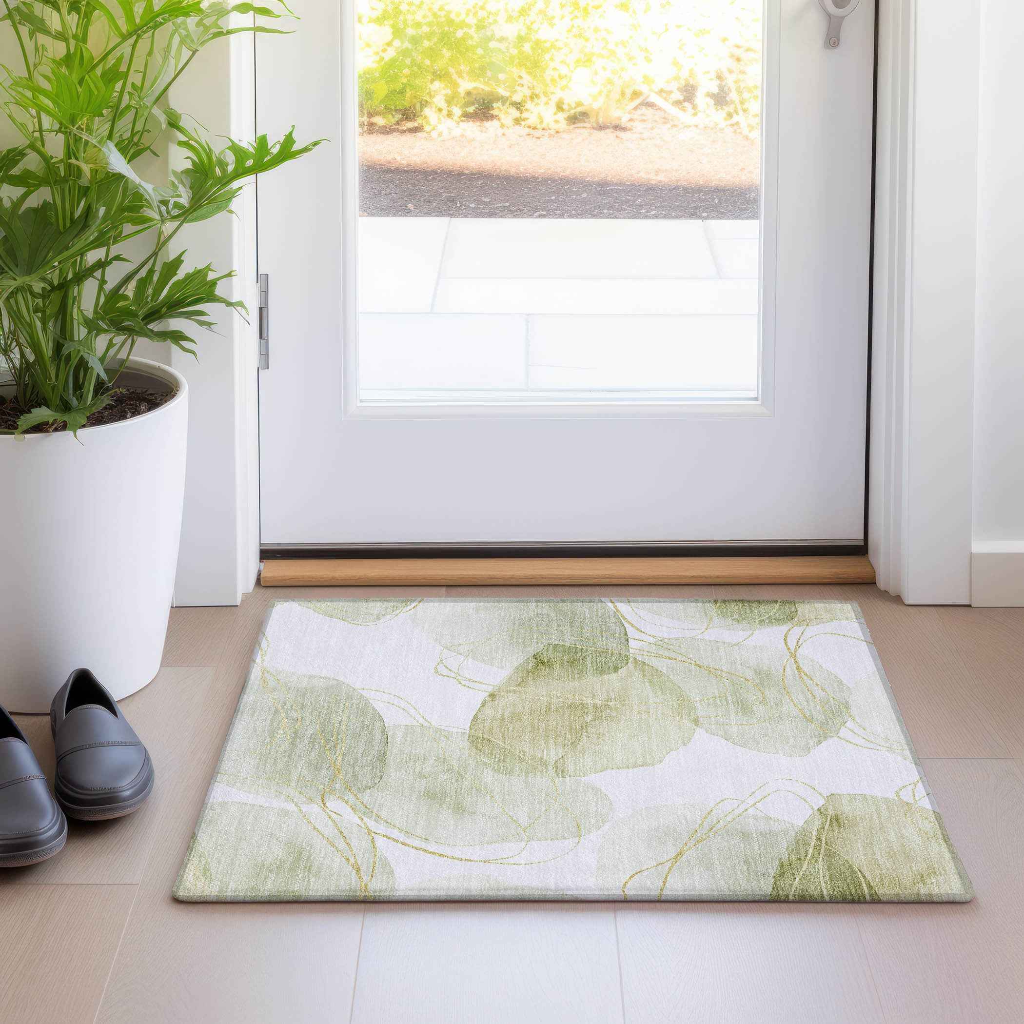 2' X 3' Green and Ivory Abstract Washable Non Skid Indoor Outdoor Area Rug